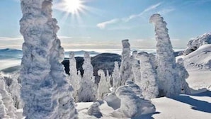 A snowy landscape with ice formations.