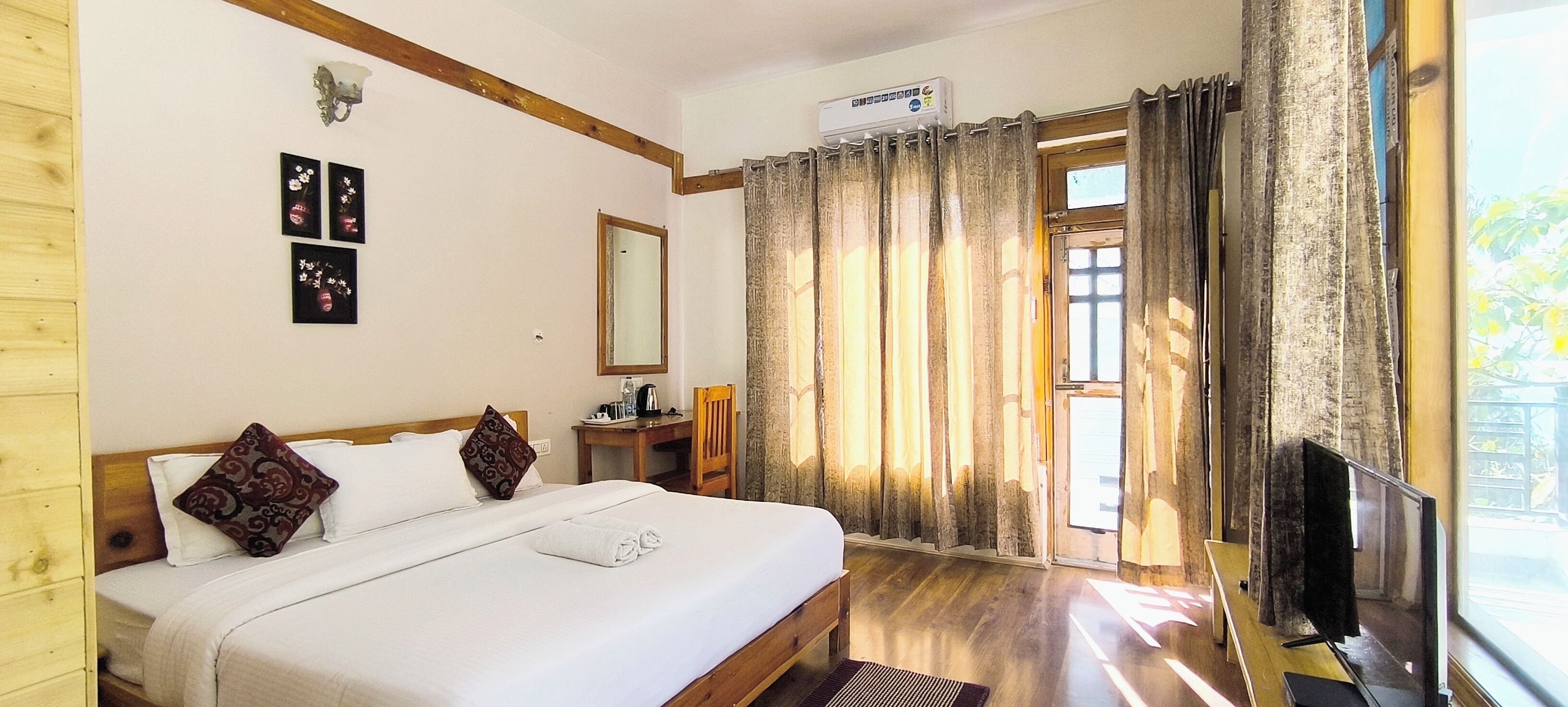 Deluxe Double Room, Balcony, River View | Desk, laptop workspace, free WiFi