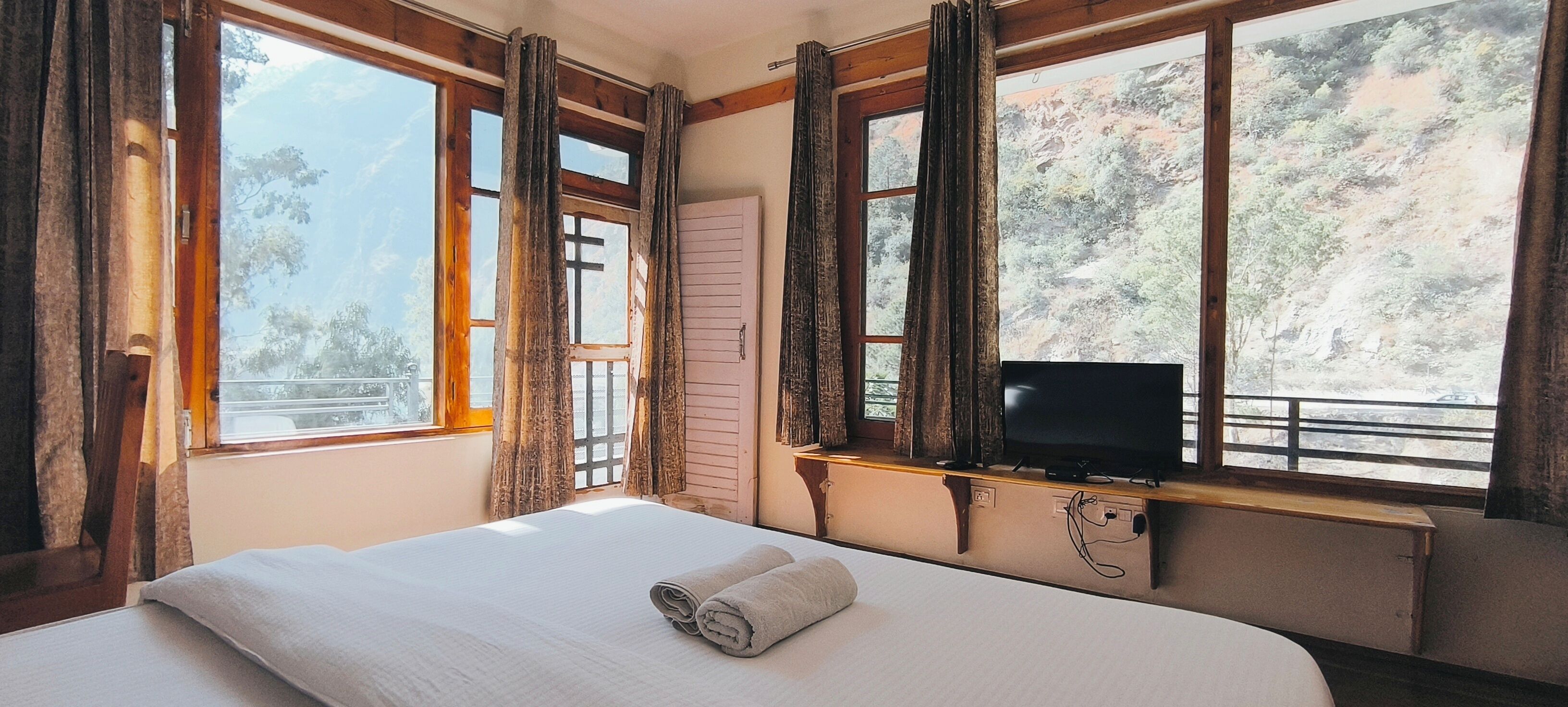 Deluxe Double Room, Balcony, River View | Desk, laptop workspace, free WiFi