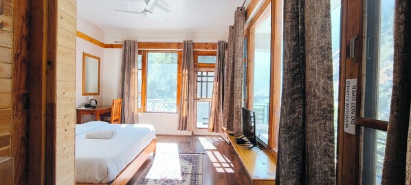 Deluxe Double Room, Balcony, River View | Desk, laptop workspace, free WiFi