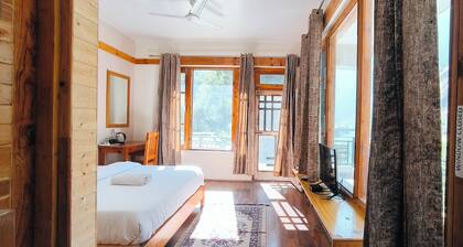 Tirthan Grand Riverside