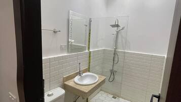 Shower, bathrobes, slippers, towels