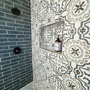 Shower, eco-friendly toiletries, hair dryer, towels