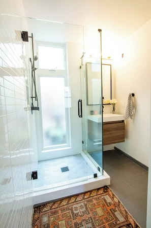 Shower, hair dryer, towels, soap
