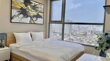 Apartment, 2 Bedrooms | 1 bedroom, desk, blackout curtains, iron/ironing board