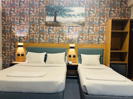 Family Triple Room | Desk, free WiFi