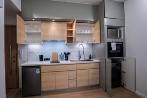 Lyxlägenhet - utsikt mot staden | Eget kök