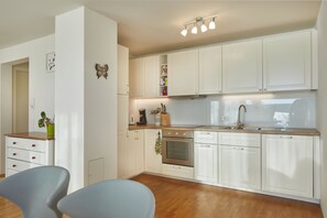 Réfrigérateur, four, plaque de cuisson, lave-vaisselle