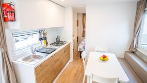 Fridge, microwave, coffee/tea maker, highchair