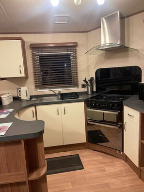 Microwave, oven - 3 Bedroom Caravan (Grove 12) on Trecco Bay Holiday Park, Porthcawl (Porthcawl)