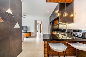 Fridge, microwave, stovetop, coffee/tea maker