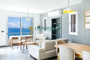 Villa, Sea View | Living area | Flat-screen TV
