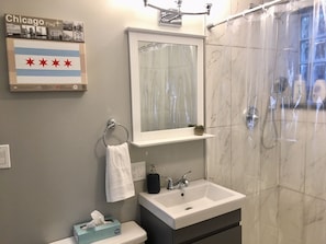 Shower, hair dryer, towels, soap