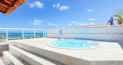 Duplex penthouse by the sea with jacuzzi and waterfall