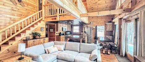 Smart TV, fireplace, books, stereo