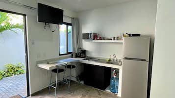 Fridge, microwave, stovetop, coffee/tea maker