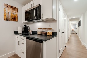 Fridge, microwave, stovetop, coffee/tea maker