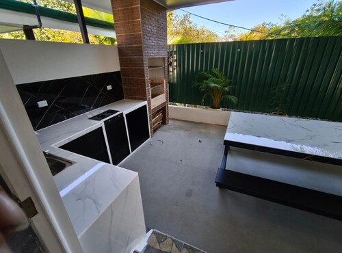 New 2 bdr beach house with WIFI, BBQ and secure carport. Relax in style.