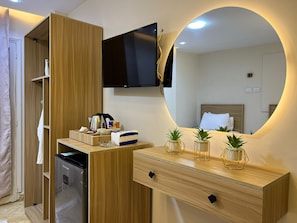 Suite Deluxe, vista montagna | Biancheria da letto ipoallergenica, minibar, con stile personalizzato