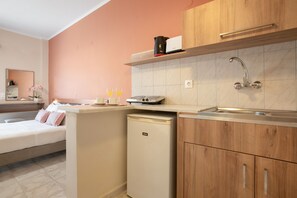 Fridge, stovetop, electric kettle, toaster