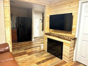 Smart TV, fireplace, ping pong