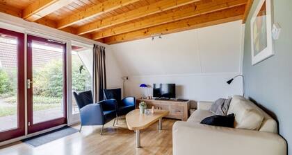 Dunnock I Home with Fireplace in Surrounding Garden