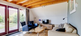 Dunnock I Home with Fireplace in Surrounding Garden