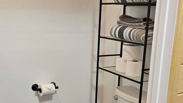 Hair dryer, towels, soap, toilet paper