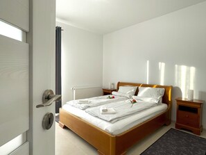 1 habitación, tabla de planchar con plancha, wifi gratis y ropa de cama 