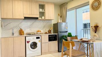 Microwave, stovetop, toaster, cookware/dishes/utensils