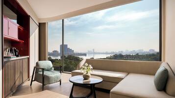Suite, 1 Bedroom (1 King) | Living area | 55-inch Smart TV with cable channels