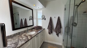 Shower, hair dryer, towels, soap