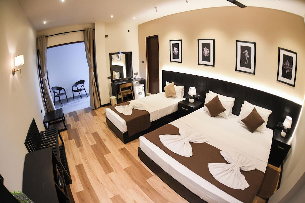 Chambre Triple Supérieure, vue établissement