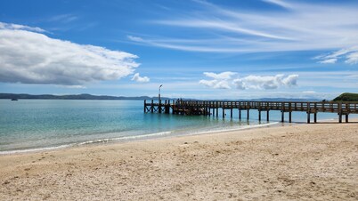 Elevated Coastal Retreat in Maraetai
