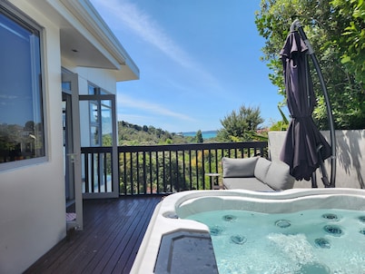Elevated Coastal Retreat in Maraetai