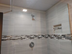 Shower, towels, soap, toilet paper