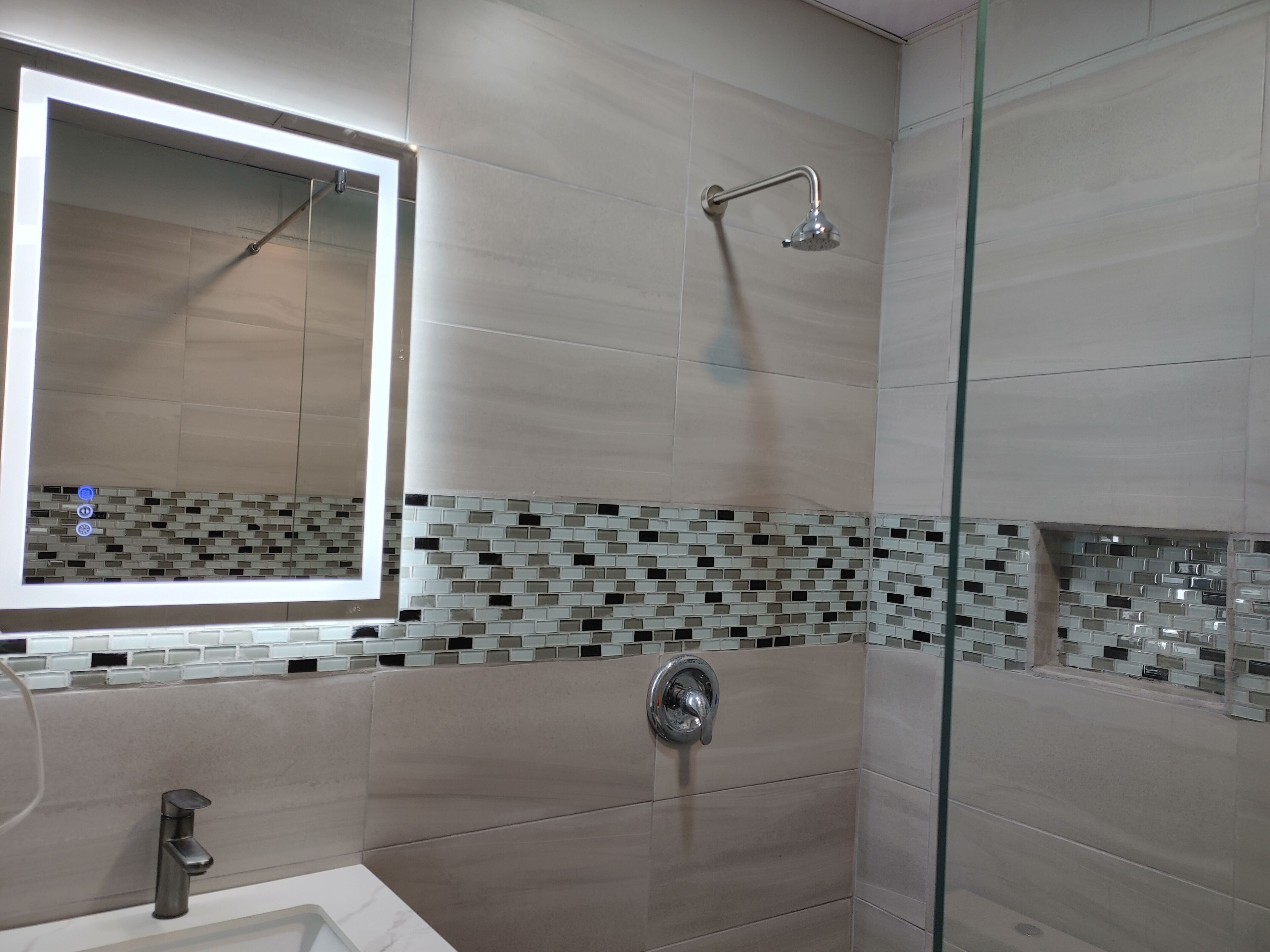 Shower, towels, soap, toilet paper