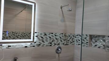 Shower, towels, soap, toilet paper