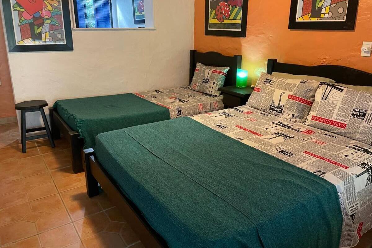 Cabana clássica, varanda coberta, vista para o jardim | 1 quarto, Wi-Fi de cortesia