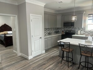 Fridge, microwave, oven, stovetop - 2 kitchens/2 decks, downstairs and upstairs. Also walking distance to the beach (Galveston)