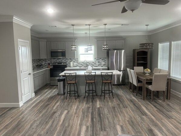 Dining - 2 kitchens/2 decks, downstairs and upstairs. Also walking distance to the beach (Galveston)