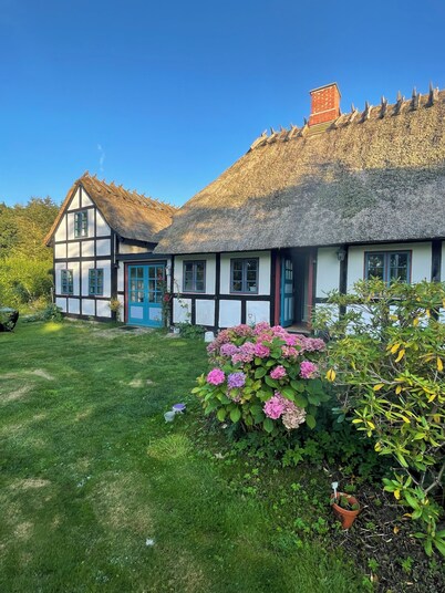 Farmhouse with large garden in beautiful nature near the beach