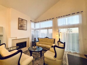 Smart TV, fireplace, books