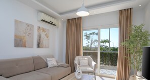 50-inch flat-screen TV with premium TV channels - Sokon Residence Rehab (New Cairo)