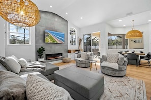 TV, fireplace, books, offices