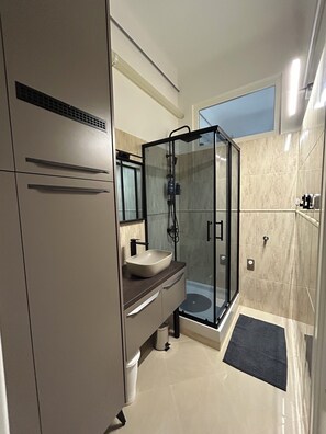 Hair dryer, towels, soap, toilet paper