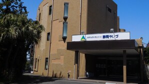 A modern building with a sign indicating it is a hotel. - Hotel Tetora Resort Shizuoka Yaizu (Yaizu)