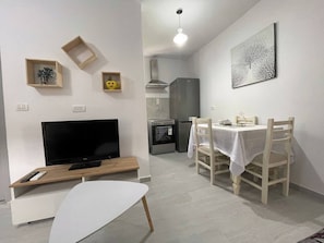 Apartamento, 2 quartos, acessível, sacada | Sala de jantar