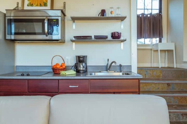 Fridge, microwave, coffee/tea maker, toaster