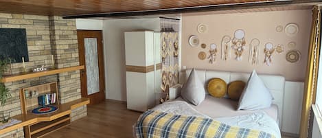 1 chambre, fer et planche à repasser, accès au Wi-Fi (inclus)